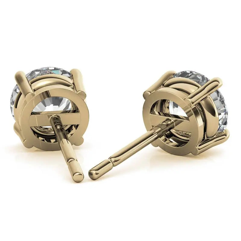 0.50 CTW lab grown diamond stud earrings with round brilliant cut diamonds set in 14K yellow gold prong settings