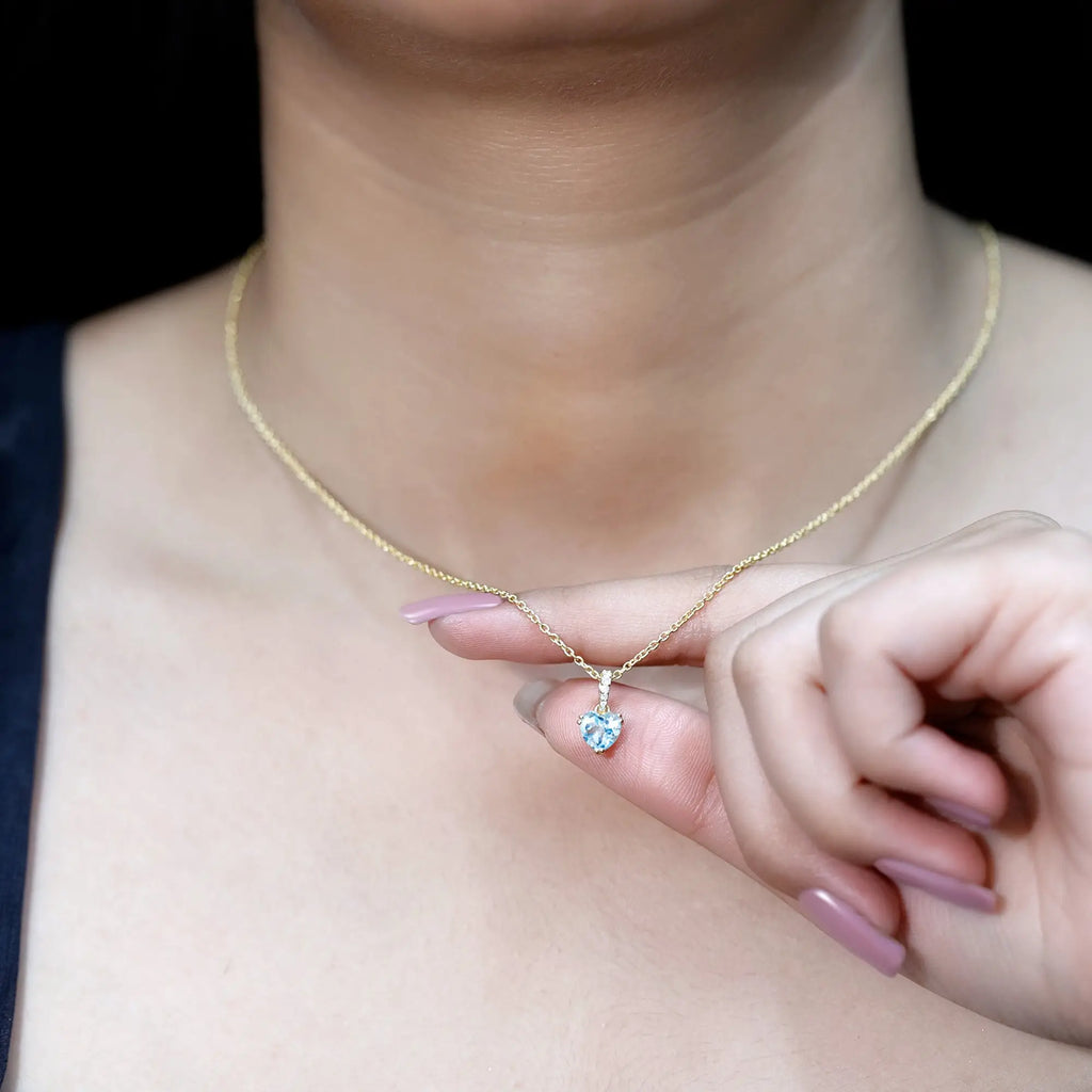 0.9 Carat Swiss Blue Topaz Solitaire and Diamond Heart Necklace with Chain