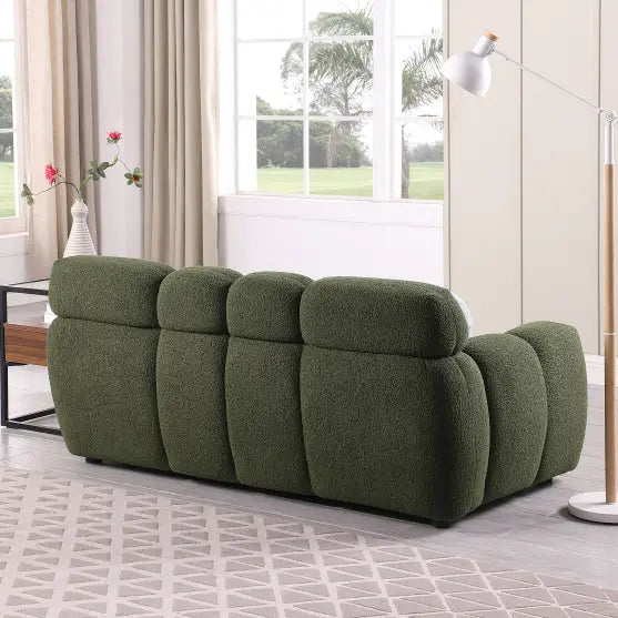 Elegant green boucle sofa for luxury fashion in living spaces