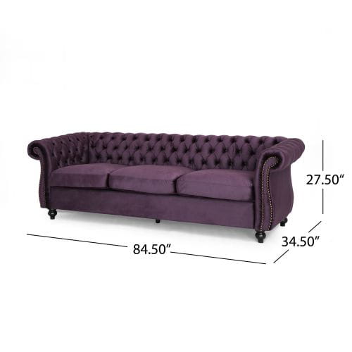 Luxurious purple velvet sofa for timeless designer clothing aesthetics