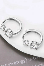 1.3 Carat Moissanite sterling silver hoop earrings featuring round-cut clear stones in four-prong settings