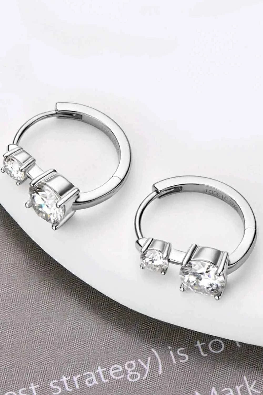 1.3 Carat Moissanite sterling silver hoop earrings featuring round-cut clear stones in four-prong settings
