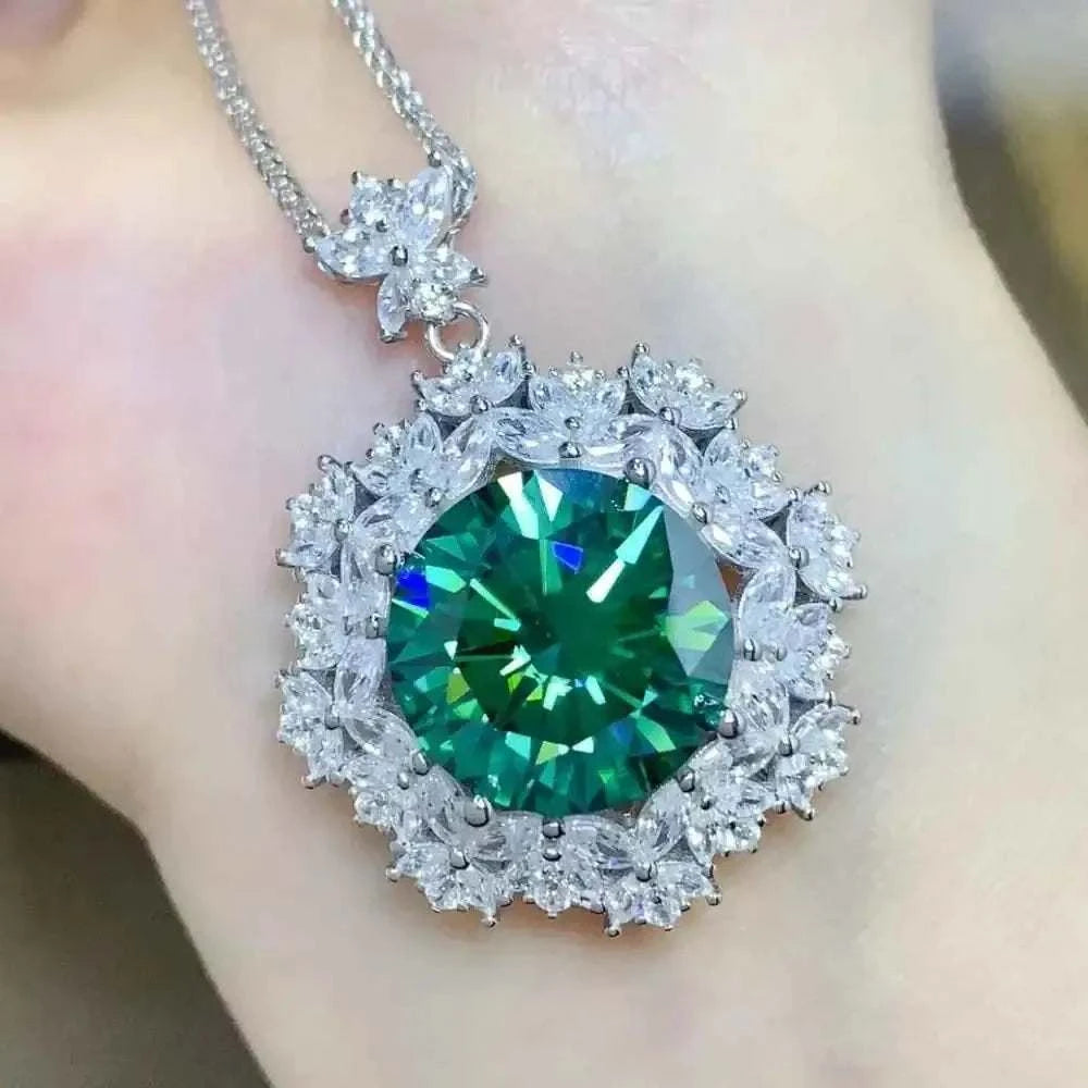 10 Carat Moissanite pendant necklace with a large green gemstone surrounded by smaller clear stones in a 925 sterling silver setting