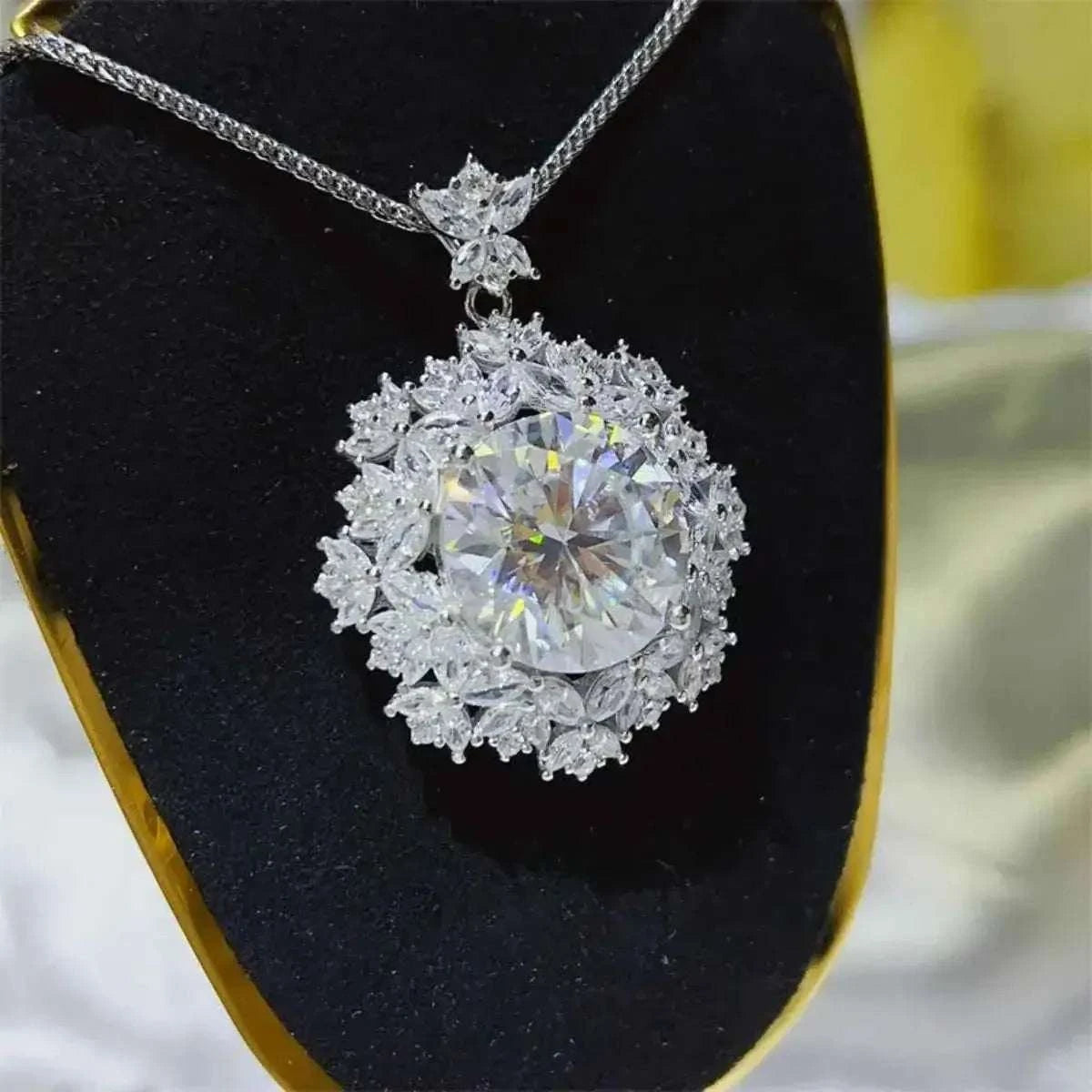 10 Carat Moissanite sterling silver necklace with a large round center stone surrounded by floral cluster of smaller stones