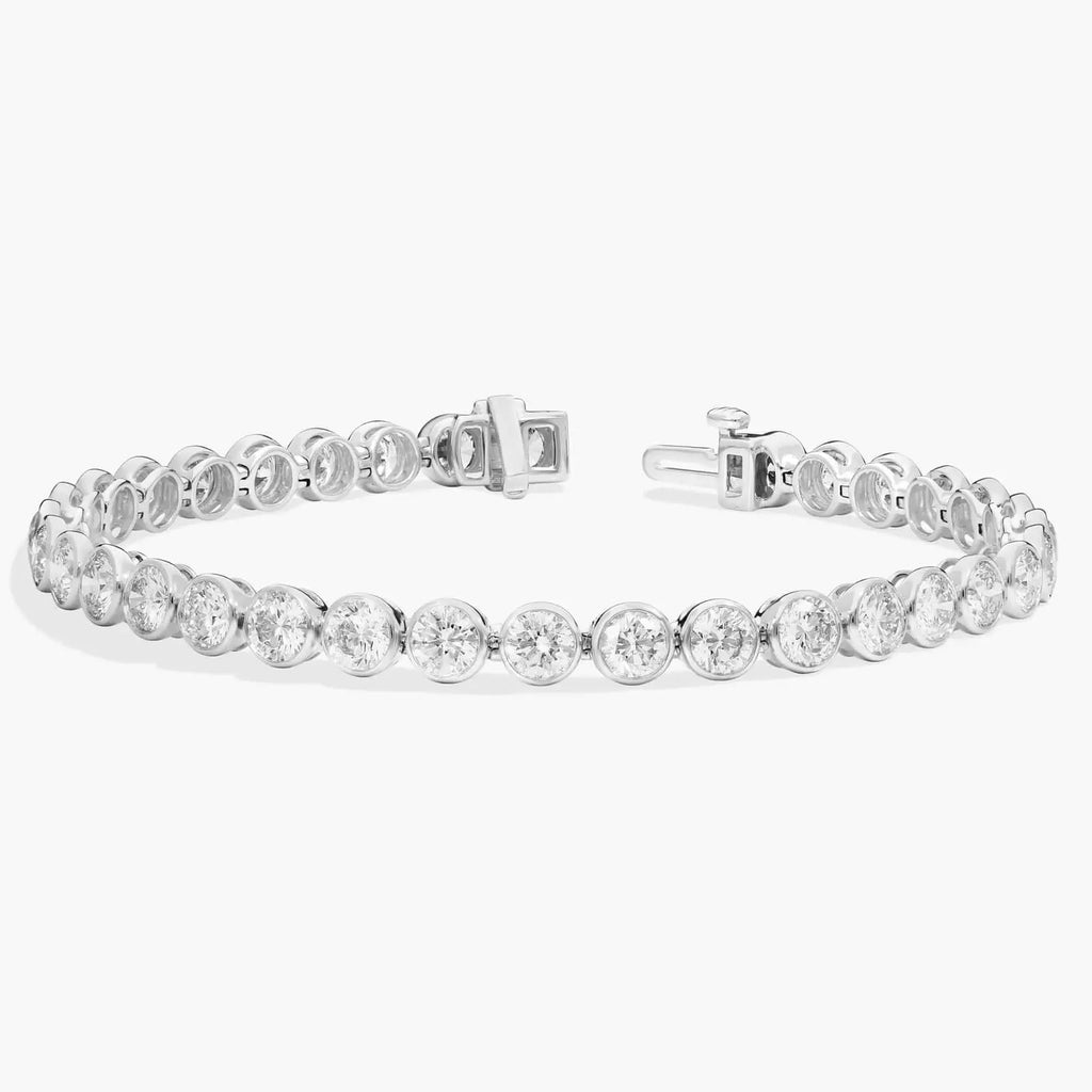 10 CTW moissanite tennis bracelet with round cut stones set in sleek rhodium plated 14K white gold bezel settings