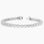 10 CTW moissanite tennis bracelet with round cut stones set in sleek rhodium plated 14K white gold bezel settings