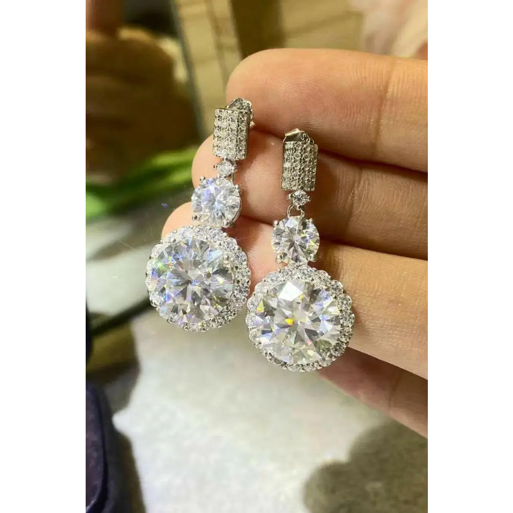 Exquisite platinum-plated moissanite drop earrings for luxury fashion $511 picture flat lay modern, fashion round 925