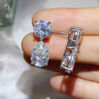 925 sterling silver earrings with round and pear-shaped clear stones, showcasing 16 Carat Moissanite sparkle and platinum plating.