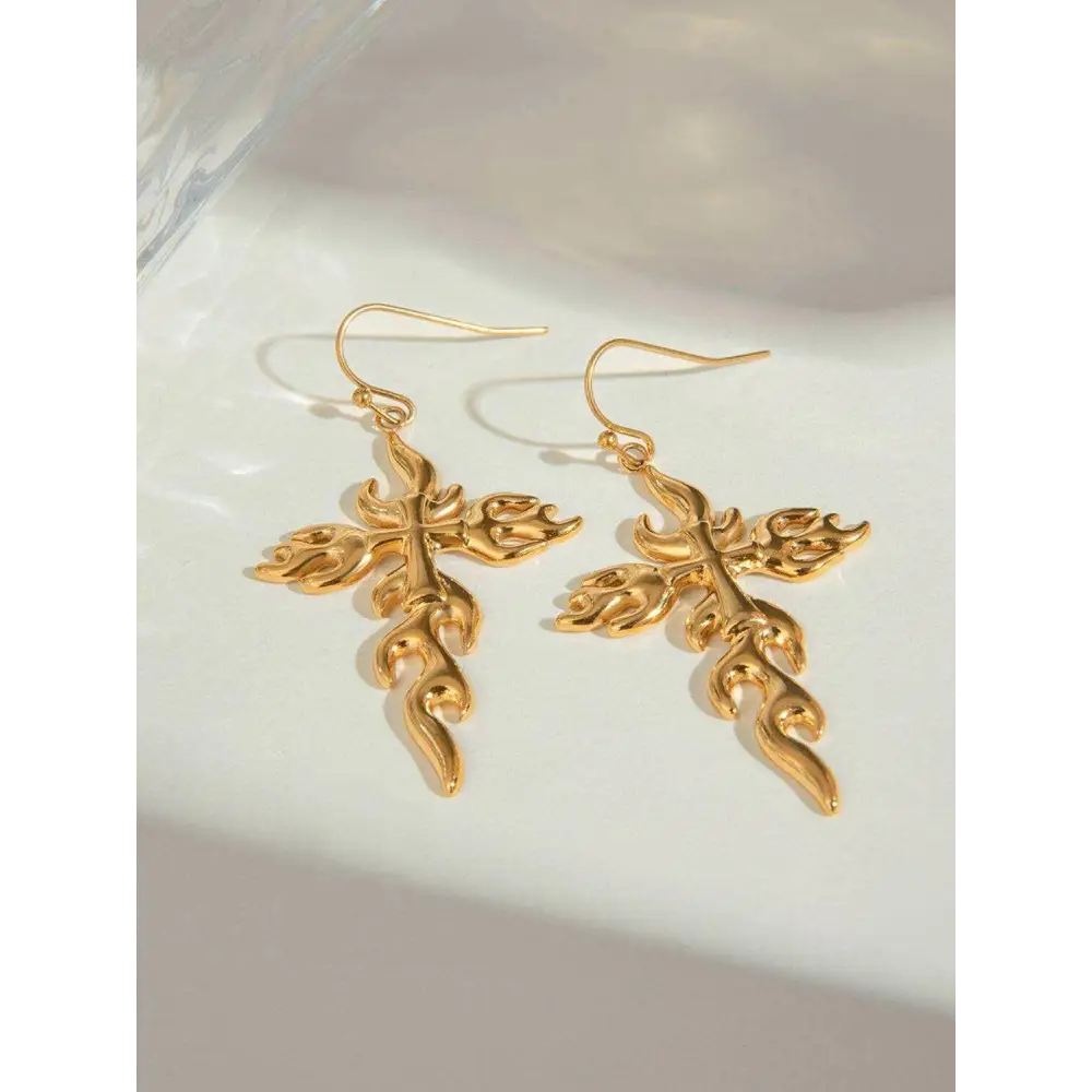 Exquisite 18k gold-plated earrings for timeless luxury fashion $12 1-pair 18k gold-plated, stainless steel care