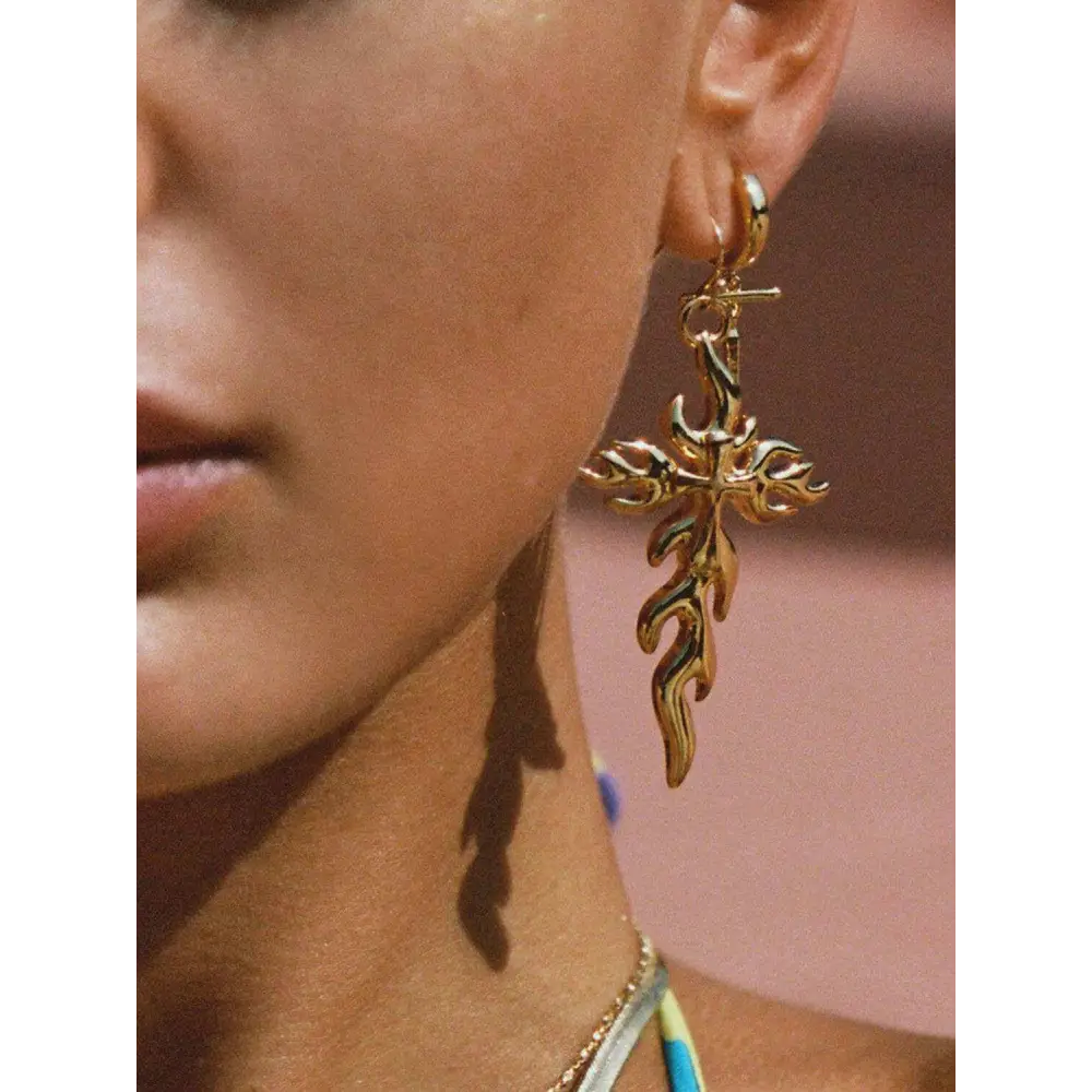 Exquisite 18k gold-plated earrings for timeless luxury fashion $12 1-pair 18k gold-plated, stainless steel care