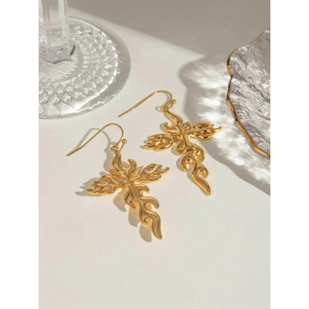 Exquisite 18k gold-plated earrings for timeless luxury fashion $12 1-pair 18k gold-plated, stainless steel care