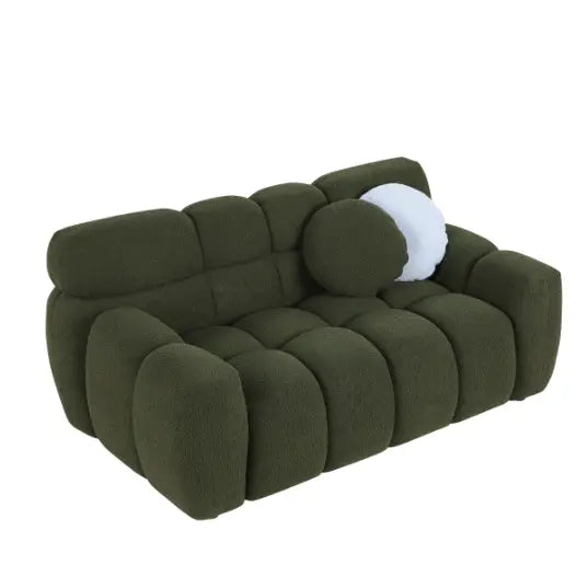 Elegant green boucle sofa for luxury fashion in living spaces