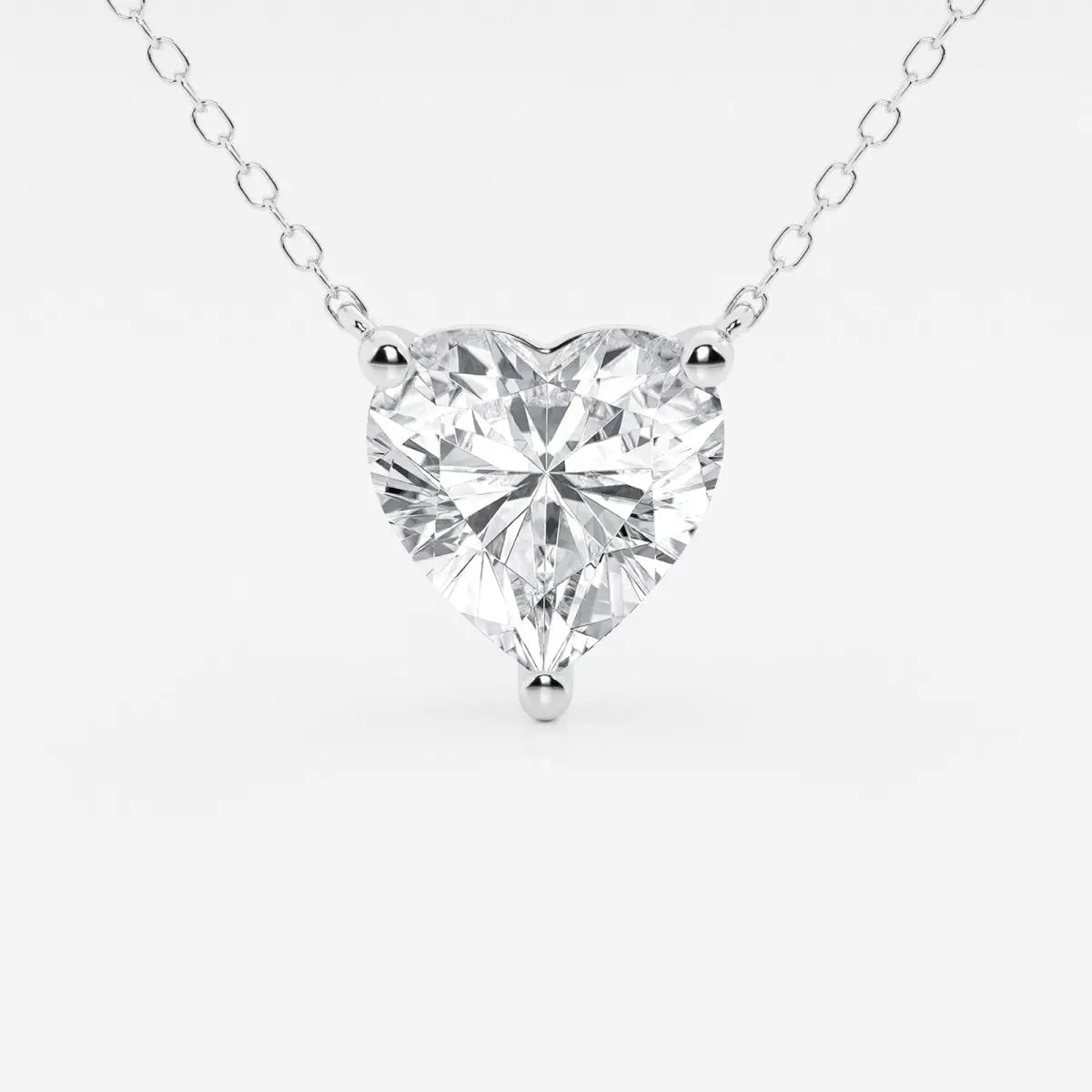 2.00 CTW Floating Heart Shape Lab Grown Diamond Solitaire Pendant Necklace F/G VS1 AGI Certified in 14K White or Yellow Gold