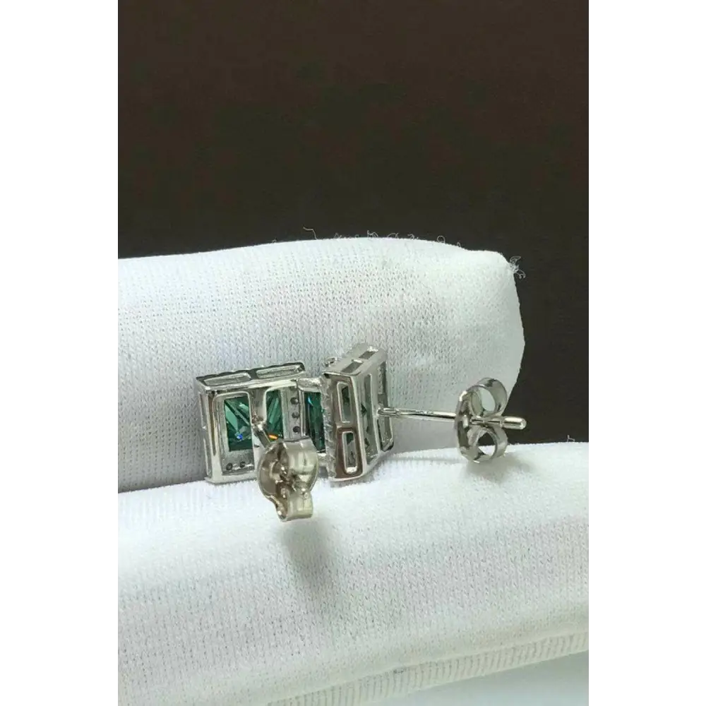 Discover the elegance of luxury moissanite square stud earrings $305 picture flat lay modern with a striking geometric