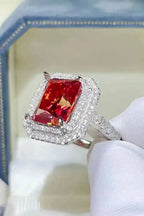 925 sterling silver ring with a large rectangular red gemstone surrounded by small white stones featuring 2 Carat Moissanite