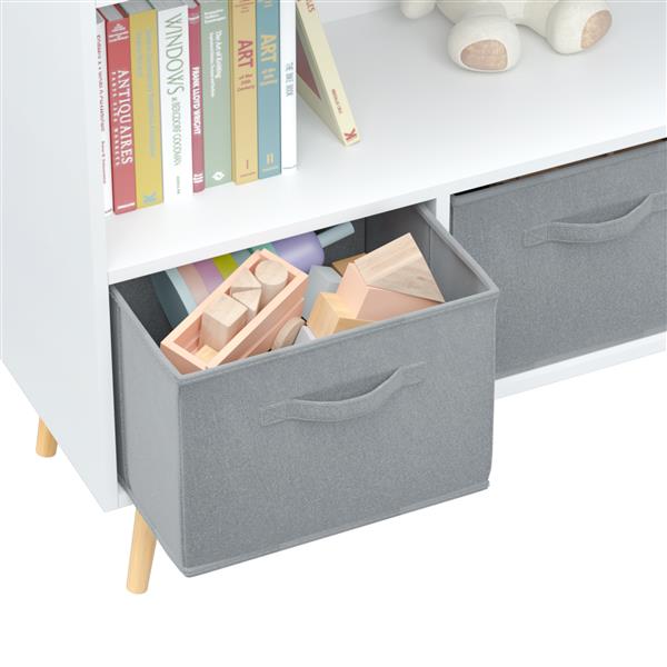 Luxury children’s bookcase with stylish fabric drawers for playroom elegance