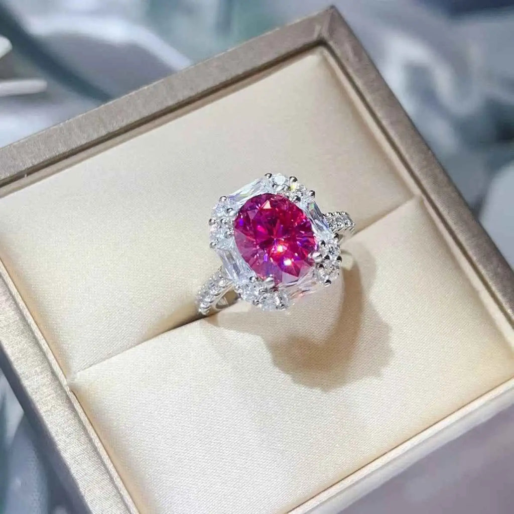 925 sterling silver ring with a vibrant pink center stone and clear accent stones featuring 3 Carat Moissanite centerpiece
