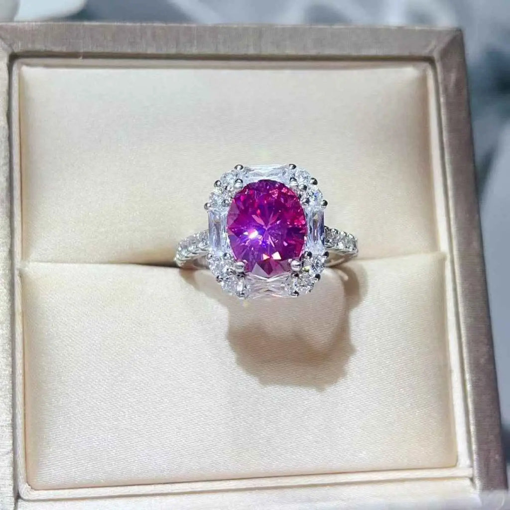 925 sterling silver ring with a vibrant pink central stone surrounded by clear smaller stones, 3 Carat Moissanite centerpiece