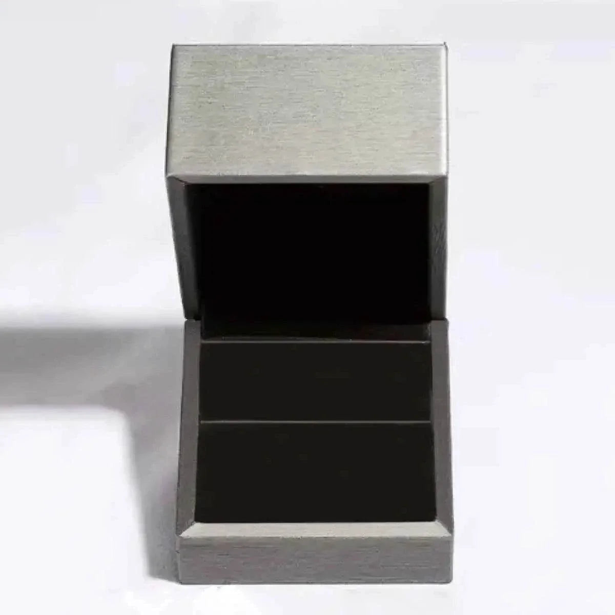 Silver ring box with black velvet interior holding 3 Carat Moissanite jewelry, platinum-plated and 925 sterling silver