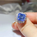 3 Carat Moissanite silver ring featuring a large square-cut blue gemstone surrounded by small clear stones