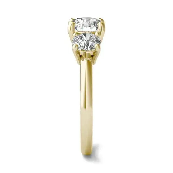 3 CTW AGI Certified three stone engagement ring in 14K yellow gold featuring round cut diamonds with excellent clarity
