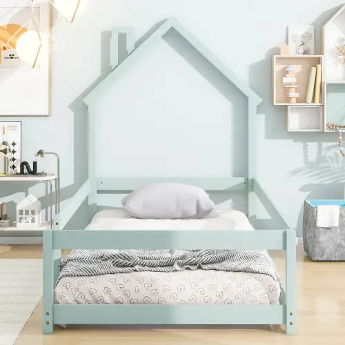 Charming twin size wood bed with house-shaped headboard in light green