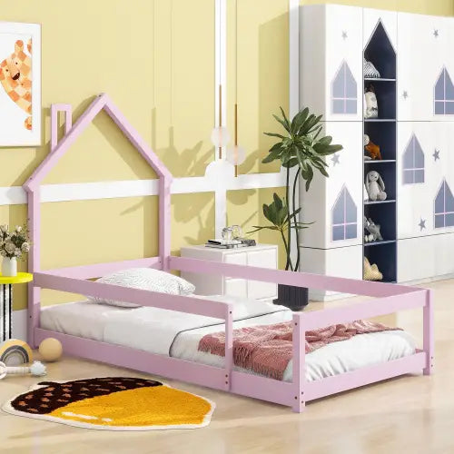 Charming twin size bed with house-shaped headboard in pink accents