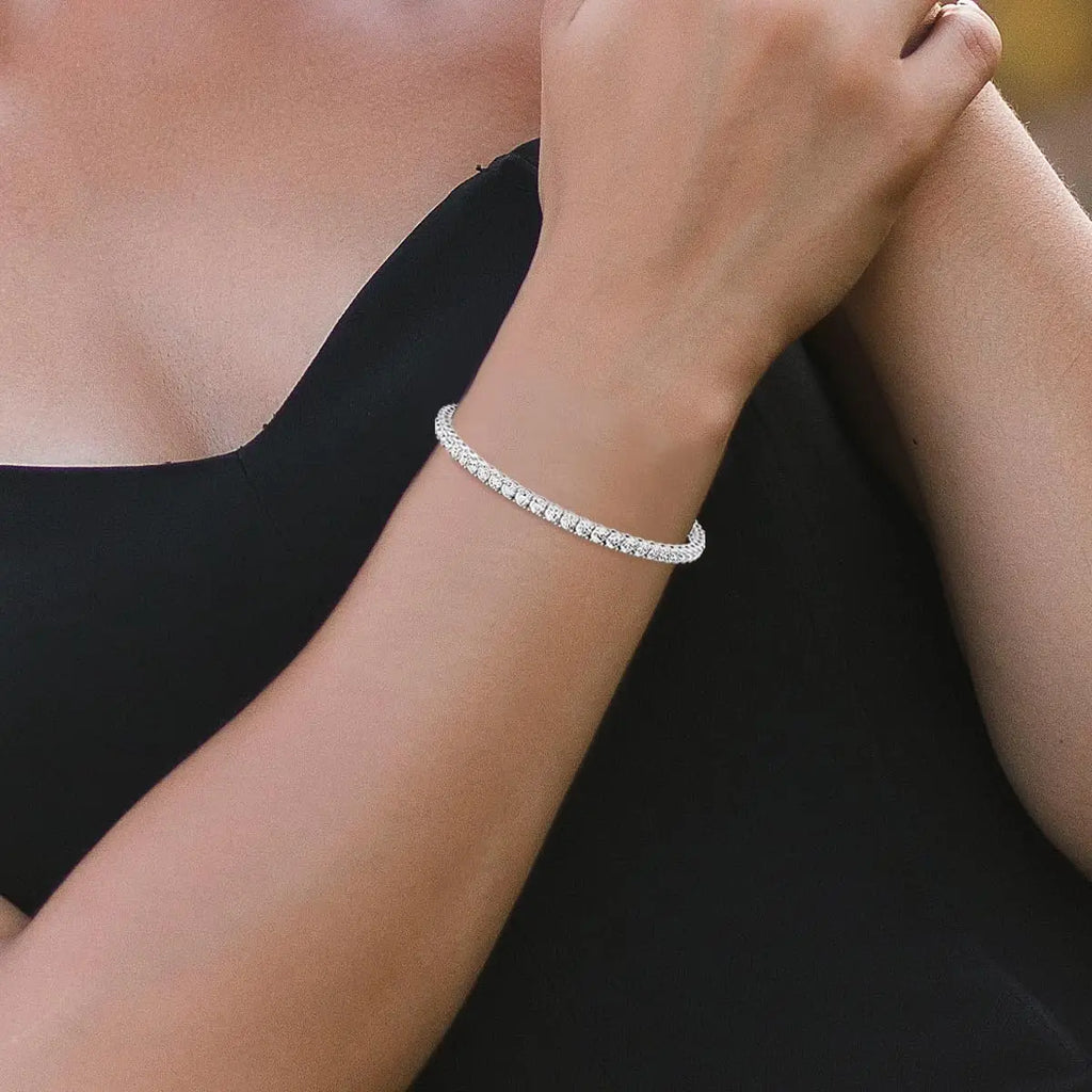 4.00 CTW tennis bracelet featuring lab-grown diamonds in a white gold 4-prong setting on a wrist