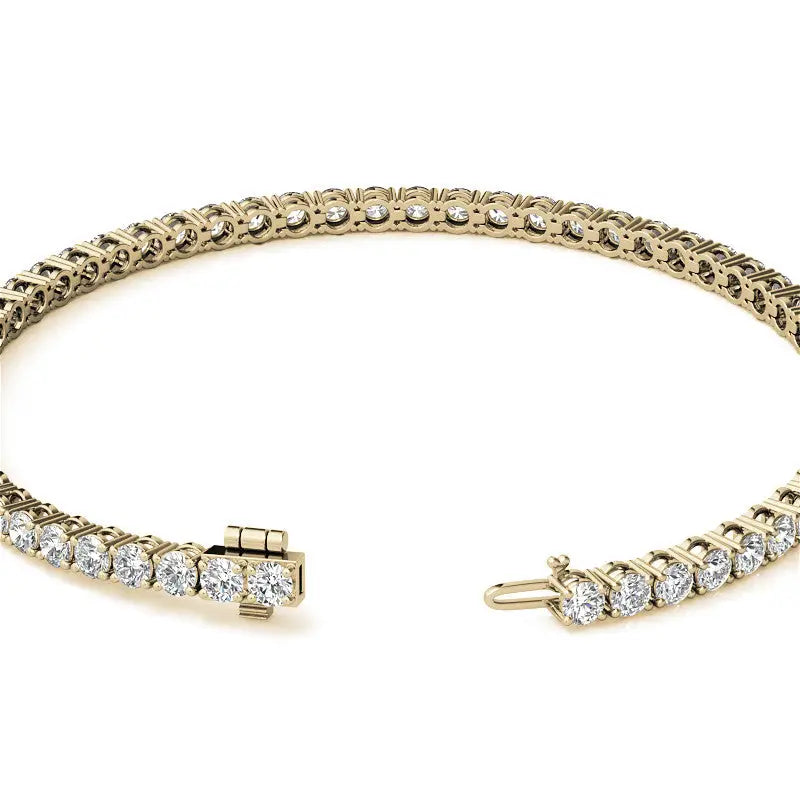 4.00 CTW tennis bracelet in 14K yellow gold featuring round lab-grown diamonds set in secure 4-prong mountings