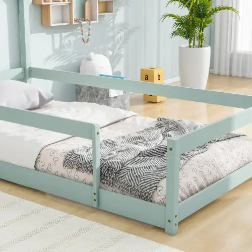 Charming twin size wood bed with house-shaped headboard in light green