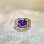 925 sterling silver ring with a large purple round center stone surrounded by small clear stones, featuring a 5 Carat Moissanite centerpiece