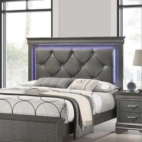 Indulge in luxury with the dark gray faux leather tufted headboard