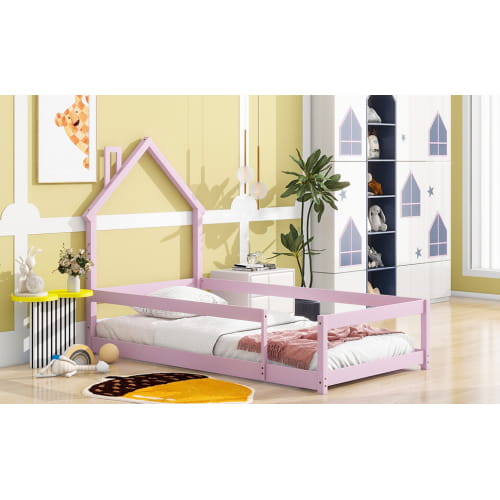 Charming twin size bed with house-shaped headboard in pink accents