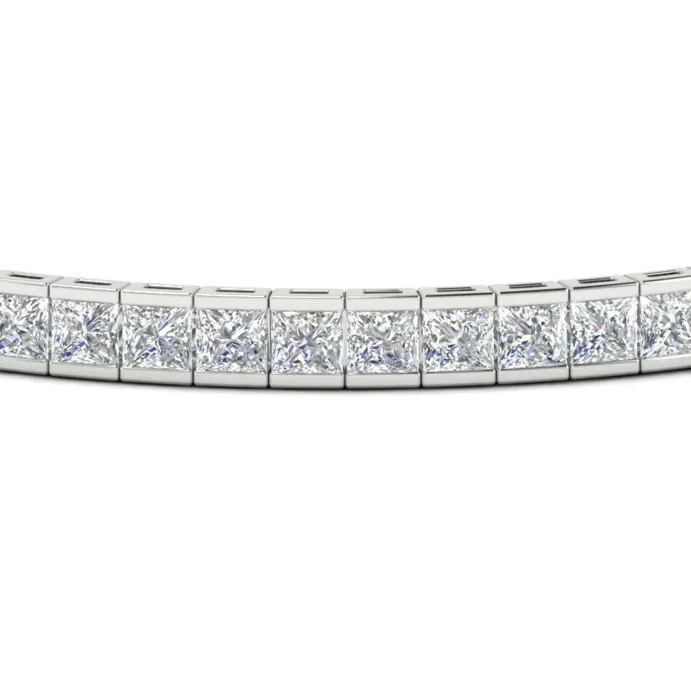 Created Moissanite princess cut tennis bracelet with half bezel setting in 14K white gold over sterling silver