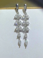 925 sterling silver dangling earrings with pear-shaped stones, showcasing 6 Carat Moissanite in a tiered design