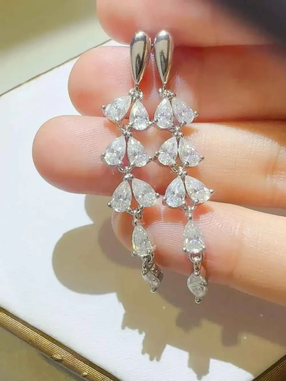 925 sterling silver dangling earrings with multiple pear-shaped clear stones, featuring 6 Carat Moissanite gems in a cluster design