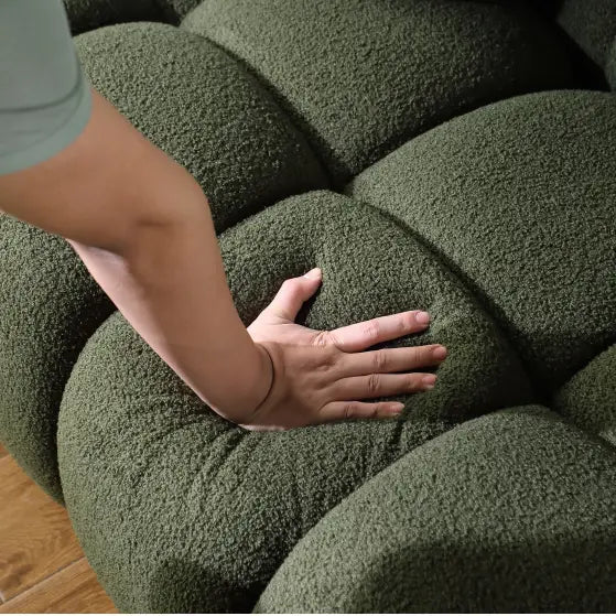 Elegant green boucle sofa for luxury fashion in living spaces