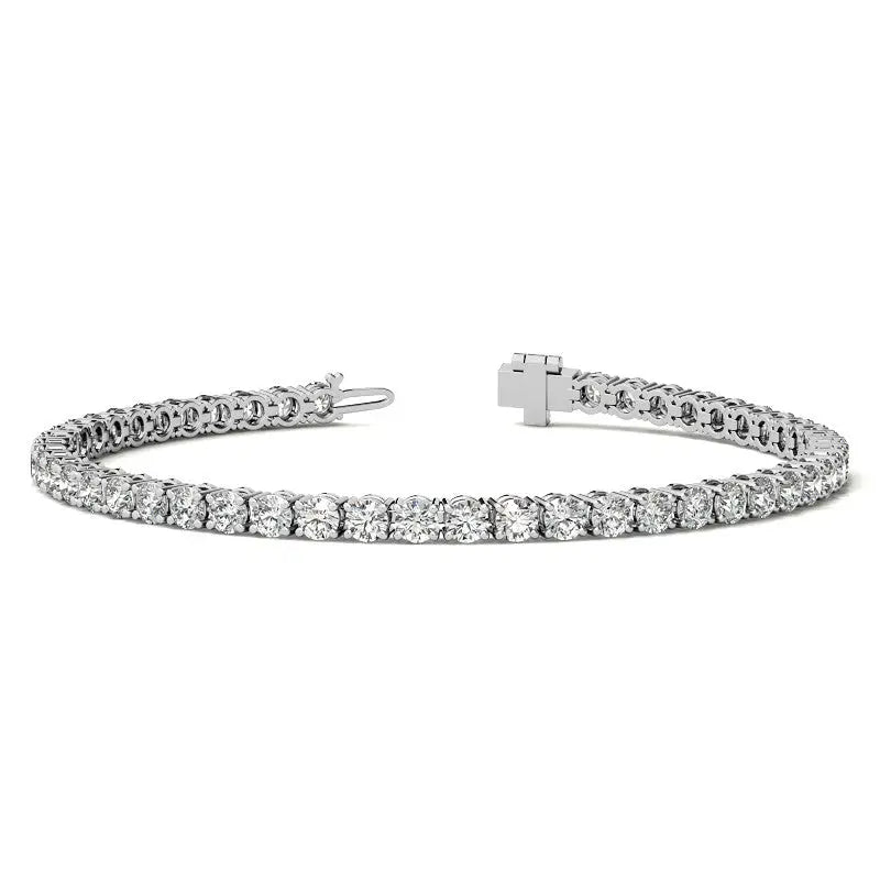 6ctw Created Sapphire tennis bracelet with 3mm round brilliant stones set in 14K white gold overlay featuring secure box clasp