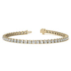 6ctw Created Sapphire tennis bracelet with 3mm round brilliant stones set in 14K yellow gold overlay with secure clasp