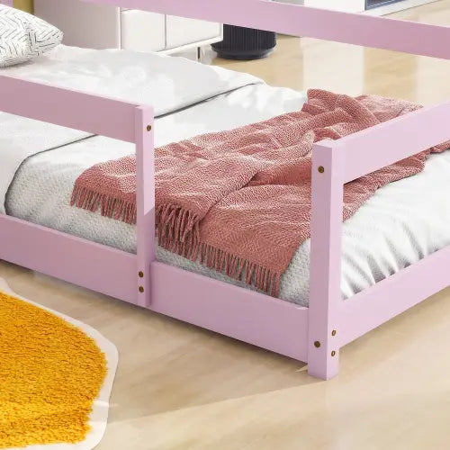 Charming twin size bed with house-shaped headboard in pink accents