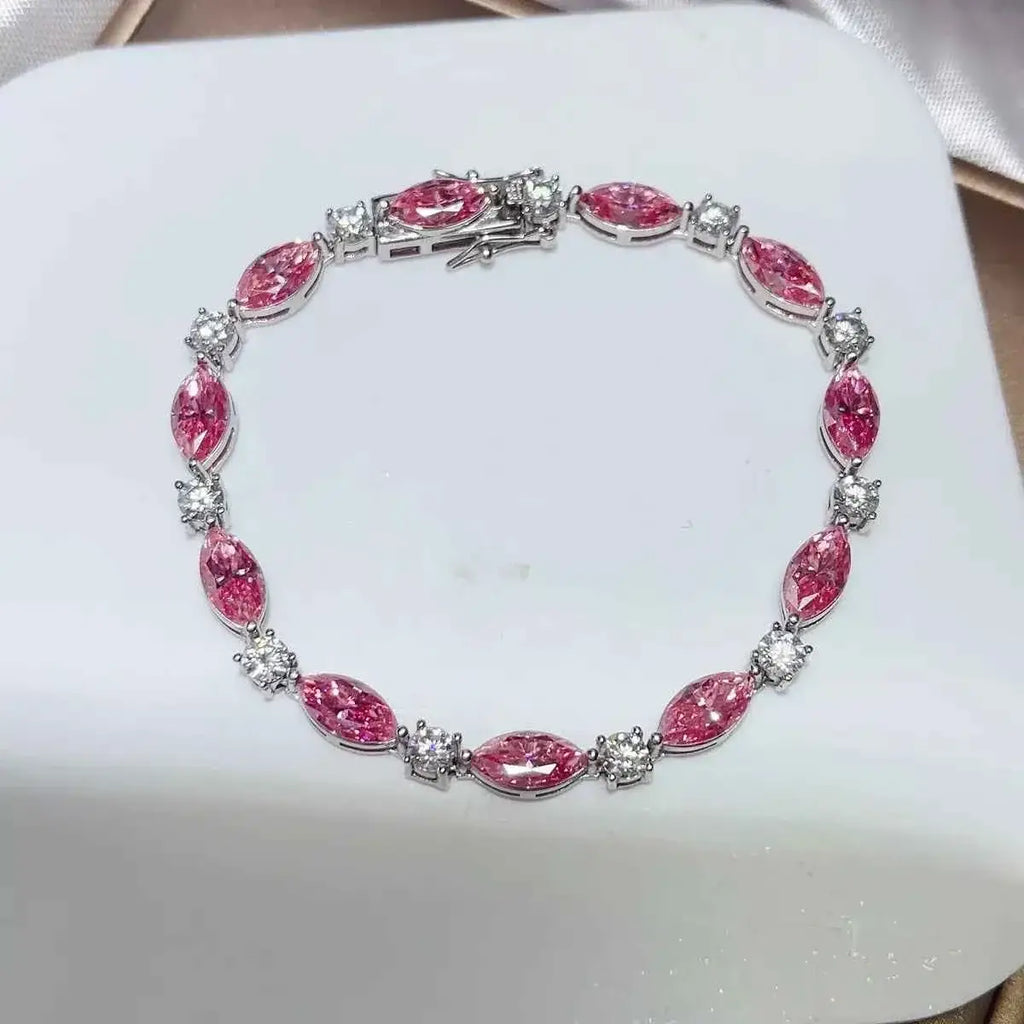 925 Sterling Silver bracelet featuring marquise pink and round clear moissanite stones in an alternating pattern