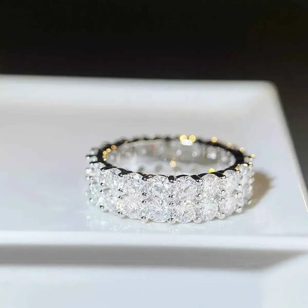 925 Sterling Silver Moissanite Ring featuring a triple row of clear round stones set in polished silver band