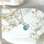Natural 1 Carat Swiss Blue Topaz and Diamond Halo Necklace With Silver Chain