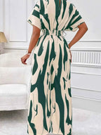 Abstract Print Wide-Leg Jumpsuit with green and cream polyester fabric featuring ruched waist and an abstract pattern