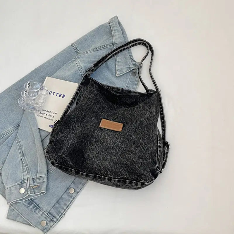 Elevate your style with the adjustable strap denim shoulder bag $29.99 bag medium denim imported product length 13 in,