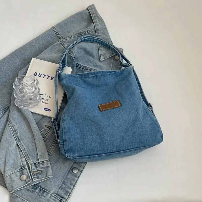 Elevate your style with the adjustable strap denim shoulder bag $29.99 bag medium denim imported product length 13 in,