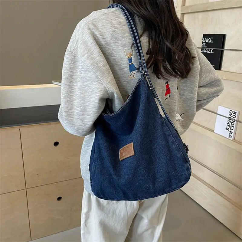 Elevate your style with the adjustable strap denim shoulder bag $29.99 bag medium denim imported product length 13 in,