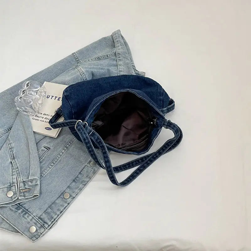 Elevate your style with the adjustable strap denim shoulder bag $29.99 bag medium denim imported product length 13 in,