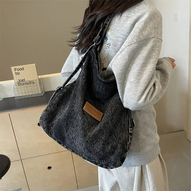 Elevate your style with the adjustable strap denim shoulder bag $29.99 bag medium denim imported product length 13 in,