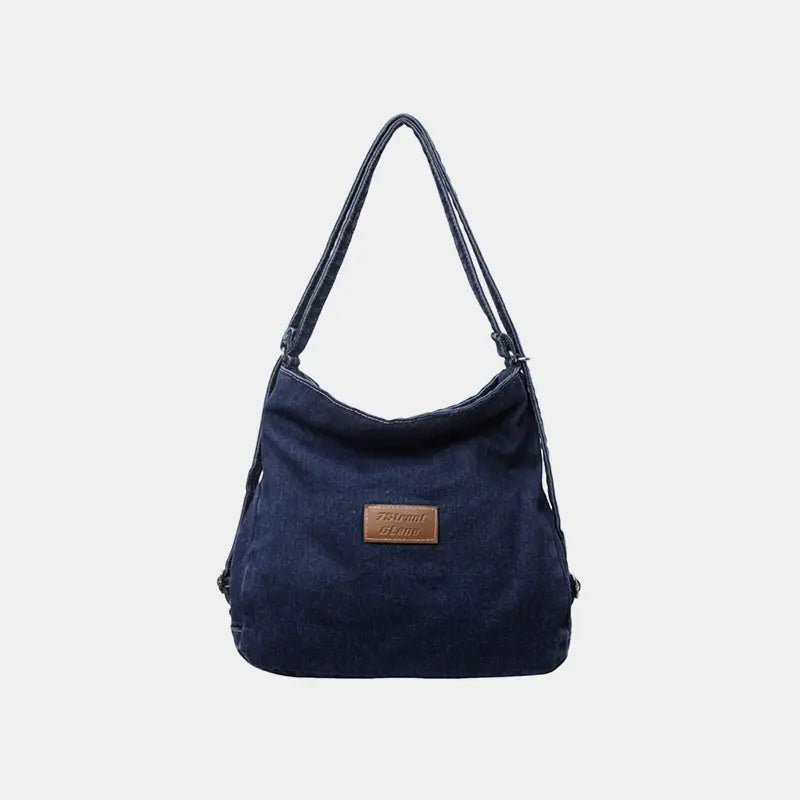 Elevate your style with the adjustable strap denim shoulder bag $29.99 bag medium denim imported product length 13 in,